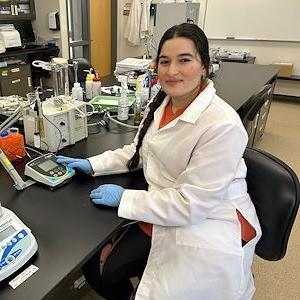 Image of Montco student Sihem Nadour in a bio lab